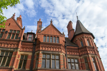 Beautiful weathered brick and stone architecture on an old building in York, England
