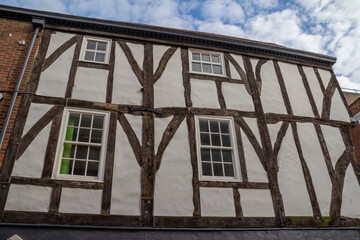 Close up texture background view of beautiful old half timber framed building architecture in York, England
