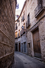 Historical architecture in Toledo town, narrow street in old town Toledo, Spain