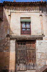 Fototapeta na wymiar Historical architecture in Toledo town, narrow street in old town Toledo, Spain