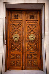 Details of old wooden door with carved elements, old architecture
