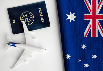 Flag of Australia with passport and toy airplane. Flight travel concept  © mirsad