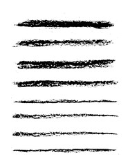 A brush set made with chalk and charcoal strokes in black on white background