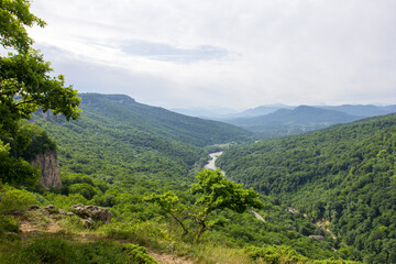 Obraz premium summer, sunny day, mountains, traveling through the mountain range in the wild.