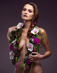 high fashion model wears ecologic dress. Floral stole made with natural leaves and orchids,...