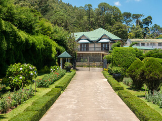 Nuwara Eliya, Sri Lanka - March 10, 2022: View of the territory of the Grand Hotel with landscaping