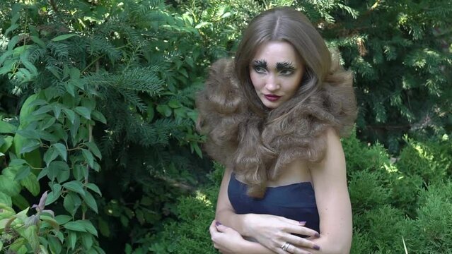 Slow Motion Fiery queen. Beautiful girl with fantasy make-up