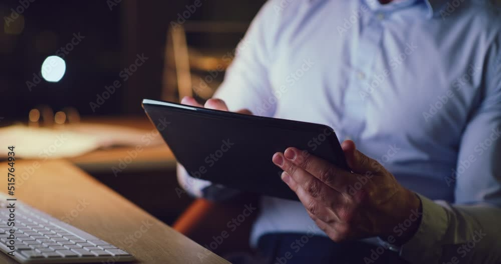 Poster closeup of a business man working late on a digital tablet in an office. hands of a dedicated and or