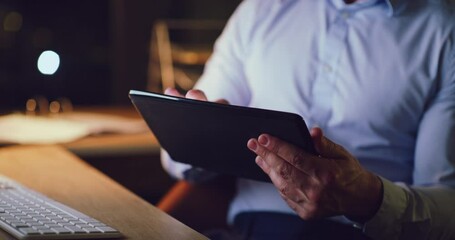 Closeup of a business man working late on a digital tablet in an office. Hands of a dedicated and organized manager searching the internet, scrolling online, browsing apps and planning ideas at night - Powered by Adobe