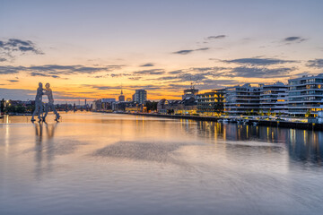 Sunset at he river Spree in Berlin with the famous TV Tower in the distance © elxeneize