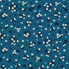 Cute floral background. Vector seamless pattern with ditsy flowers. Vintage botanical surface pattern design. Cottage core wallpaper