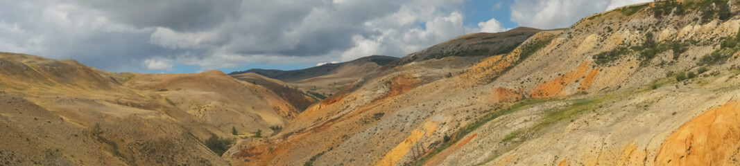 Colorful hills in Altai Republic, named Mars 2. Nature environment background, panoramic view. Natural colored texture of sandstone Martian landscape in Altai Mountains.