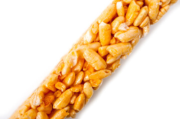 Sweetness from grains of puffed rice, shot close-up on a white background.