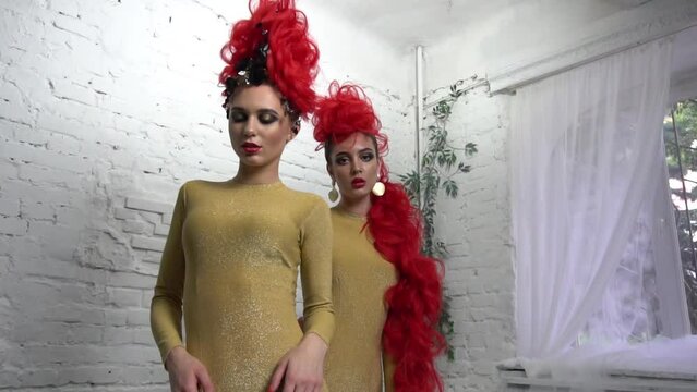 Slow Motion Fashion mohawk hairstyle, makeup. Beauty woman. 