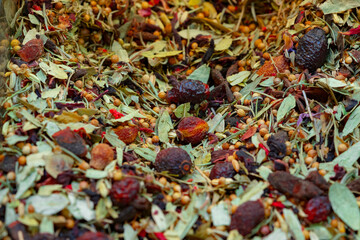 Close up of natural herbal tea made of various loose dried herbs