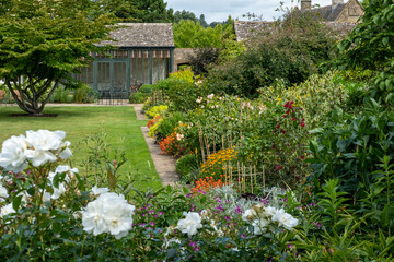 Planting at Bourton House gardens, Morton in Marsh. market town in the Cotswolds,  Gloucestershire,...