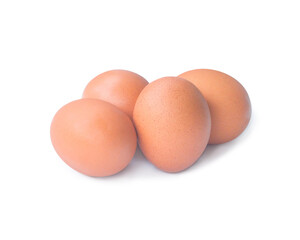 Four fresh brown chicken egss in stack or pile isolated on white background with clipping path