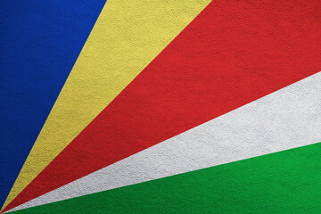 Modern shine leather background in colors of national flag. Seychelles