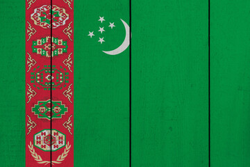 Patriotic wooden plank background in colors of flag. Turkmenistan