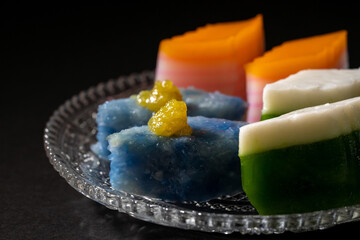 Nyonya delights dessert “Kaya Kuih” (Blue Glutinous Rice Cakes) , “Kuih Lapis” (Steamed...