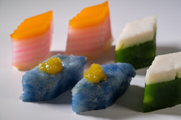 Nyonya delights dessert “Kaya Kuih” (Blue Glutinous Rice Cakes) , “Kuih Lapis” (Steamed...