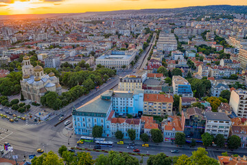 Aerial view of the city center, The Cathedral of the Assumption and boulevard in Varna, Bulgaria. Summer sunset. - obrazy, fototapety, plakaty