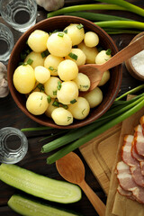 Concept of tasty food with boiled young potatoes, top view