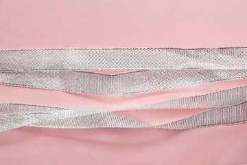 Silver ribbon on pink