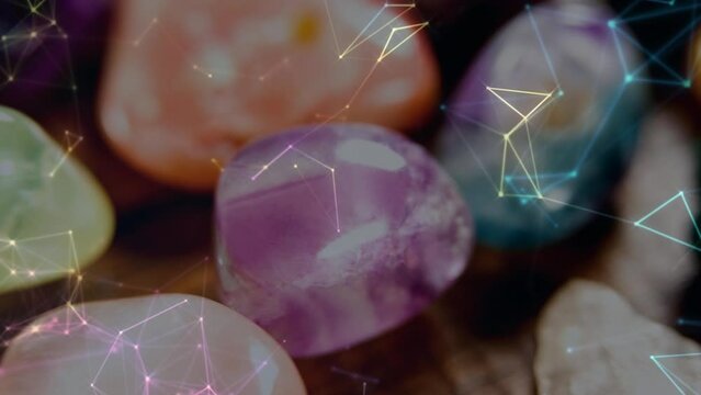 Animation of connections over colorful stones on black background