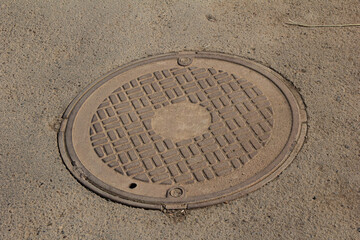 Old cast iron manhole cover