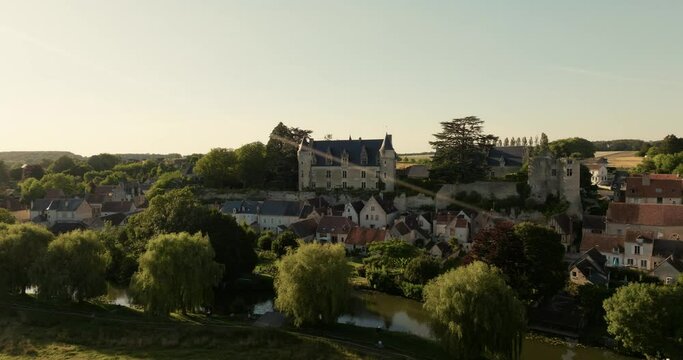 Aerial view of the castle of Montr&eacute;sor during sunset in France.