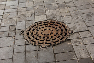 Old cast iron manhole cover