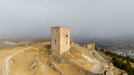 Fototapeta na wymiar Torre del homenaje del castillo de la Estrella en el municipio de Teba, Andalucía