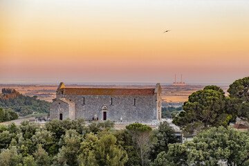Landscape view from Campiglia Marittima with church and sunset color gradients