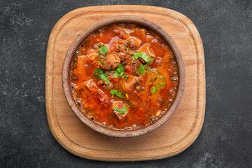 Georgian national dish Ojakhuri, in a clay plate
