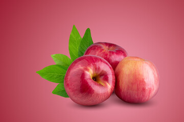 Fresh Red Apple fruit isolated on a red background