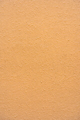 ベージュ色の壁の背景素材