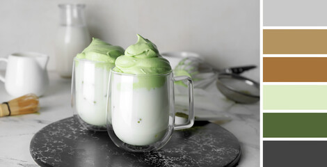Cups of tasty dalgona matcha latte on light table. Different color patterns