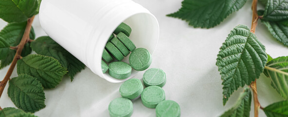 Fototapeta Jar with plant based pills on light background obraz