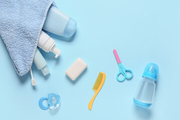 Bath accessories for baby on blue background