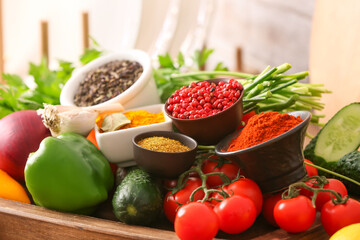 Different fresh vegetables and spices, closeup