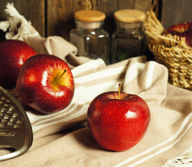 Red ripe apples on the kitchen table