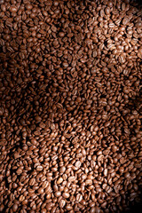 Top view of roasted natural aromatic coffee beans