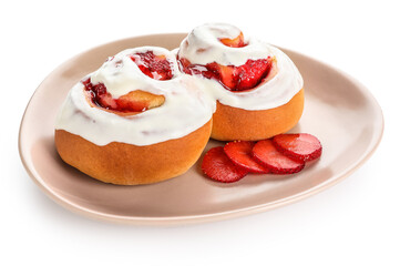 Plate of strawberry cinnamon rolls with cream on white background