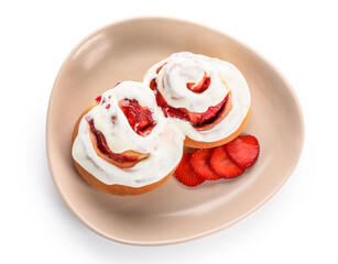 Plate of strawberry cinnamon rolls with cream on white background