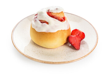 Plate of tasty strawberry cinnamon roll with cream on white background