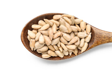 Wooden spoon with peeled sunflower seeds on white background, closeup