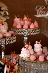  pink and white cake with strawberries and blueberries