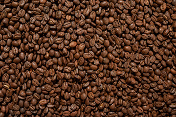 Top view of roasted organic aromatic coffee beans