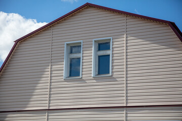 Window in the wall of the house.